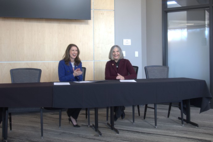 Dr. Messer smiles alongside McMurry Representative